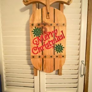 Beautiful woodcrafted hanging Christmas sled